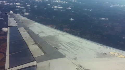 Airplane wing outside window Stock Footage 77809191