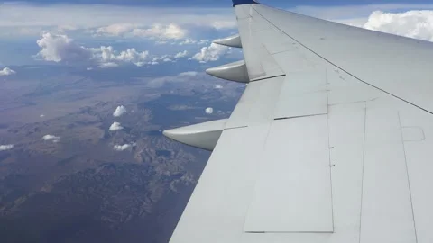 Airplane Wing Over Clouds and Nevada Desert Video stock 319030192