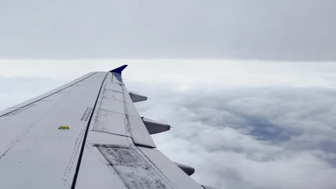 Airplane Wing Over Clouds Stock Footage 202497449