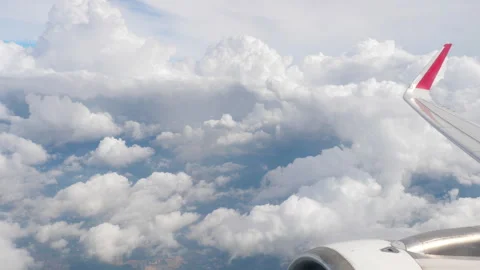Airplane wing seen through window Stock Footage 303832395