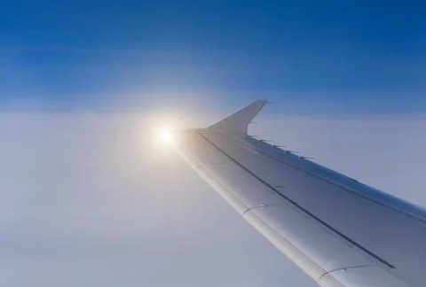 Airplane wing in the sky Stock Photos