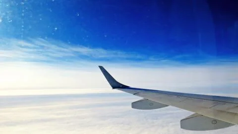 Airplane Wing in the Sky Stock Photos