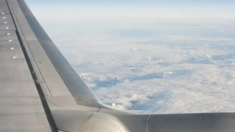 Airplane wing with sun reflections Stock Footage 115111797