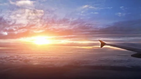 Airplane Wing Sunset Flight Aerial View Cloudscape Stock Footage 310325317