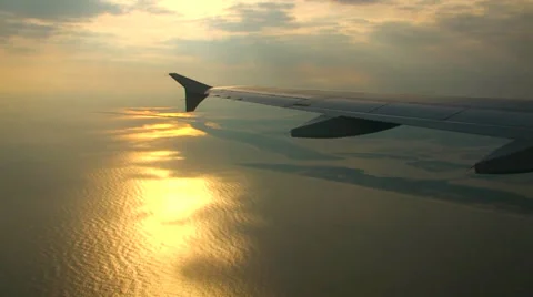 Airplane Wing at sunset Stock Footage 37689249