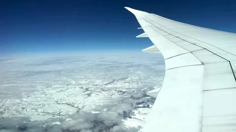 Airplane Wing View, High-Altitude Cloud Cover, Aerial Perspective Stock-Footage 310217023