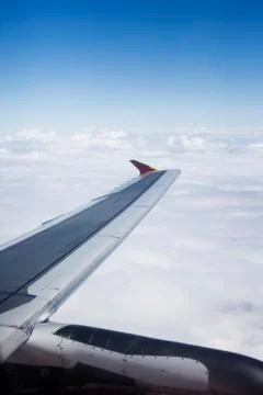 Airplane wing as viewed from window Stock Photos