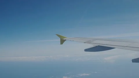 Airplane wing while flying. Flights by plane Stock Footage 154161795