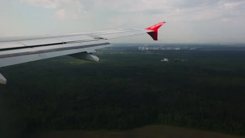 Airplane wing from the window Stock Footage 171255915