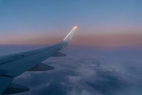 Airplane wing from window. Stock Photos
