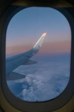 Airplane wing from window. Stock Photos