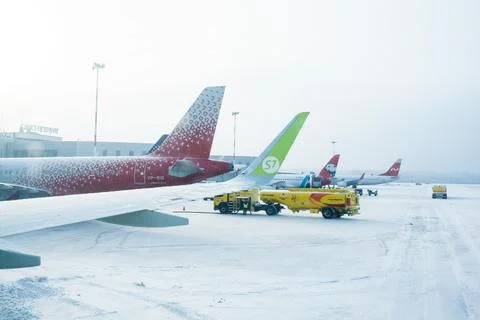 Airplane wing from window. Stock Photos
