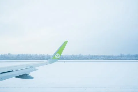 Airplane wing from window. Stock Photos