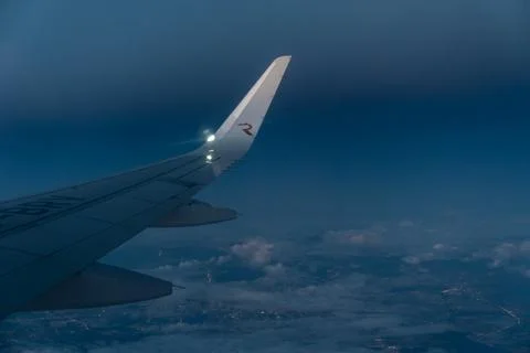 Airplane wing from window. Stock Photos