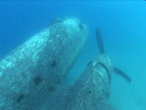 Airplane wreck underwater air craft propeller Stock Footage