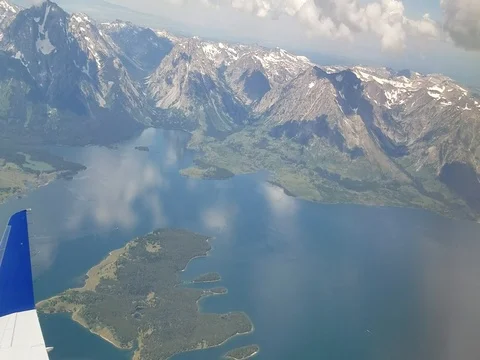 AirplaneOverMountains Stock-Footage 80260227