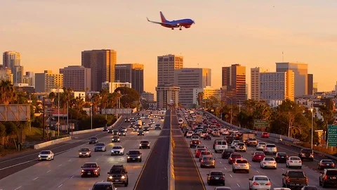 Airplanes and Traffic at Sunset | Timelapse and Slow-mo Mix Stock Footage