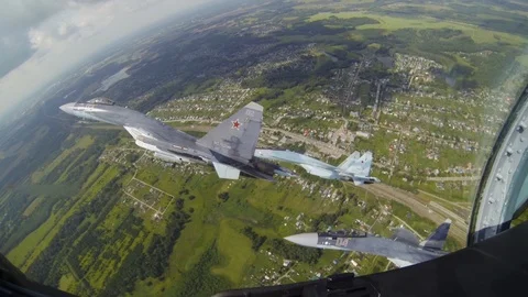 Airplanes do tricks and maneuvers, flying to war, knock out pilots in other jets Stock Footage 118553856