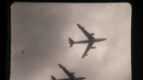 Airplanes Fly Over in Formation Below the Clouds, Aircraft Fly Stock Footage 130382399