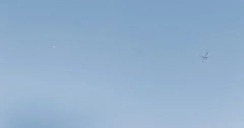 Airplanes flying in clear sky Stock Footage 204875945