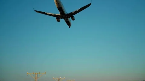 AIrplanes landing and takes off at airport Stock Footage