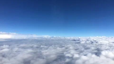 Airplane's Point of View Flying through Ground-Like Clouds Stock Footage 125922999