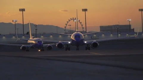 Airplanes is preparing for take off and fly to another state in the USA. Stock Footage 273639652