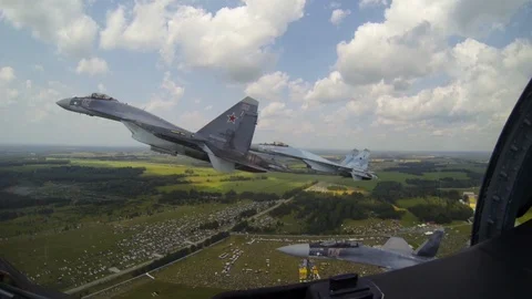 Airplanes take off to clouds and fly to scene of hostilities. It is like airshow Stock Footage 117598938