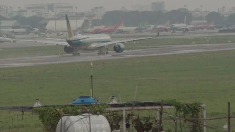 Airplanes takes off from Tan Son Nhat International airport Stock Footage 202192594