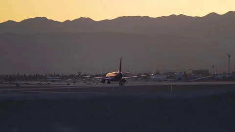 Airplanes is taking off and fly to another state in the USA. Stock Footage 273639610