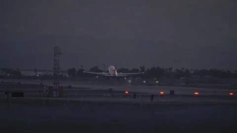 Airplanes is taking off and fly to another state in the USA. Stock Footage 273639941