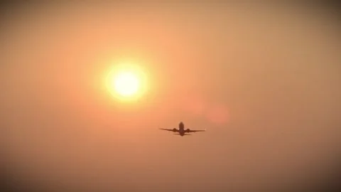 Airplanes Taking Off At Sunset Stock Footage 316784964