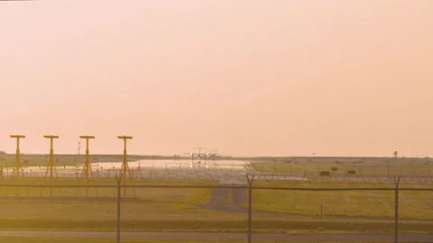 Airplanes Taking Off At Sunset Stock Footage 316784980