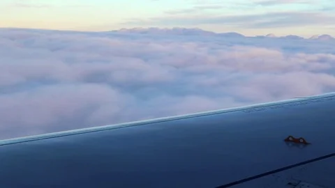 Airplane's wing in the air, flying, Close-up wing, going in a cloud Stock Footage 78110871