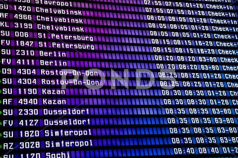 Airport departure display Stock Photos