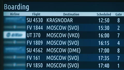 Airport display, changing information, according to the current schedule Stock Footage 92207973