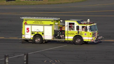 Airport fire engine truck responds to runway call Stock Footage 88777053