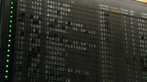 Airport flight departure timetable showing scheduled flights Stock Footage