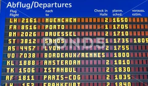 Airport flight information displayed on departure board, flight status changi Stock Photos