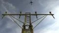 Airport lamp post, plane taking off HD Footage