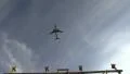 Airport lamp post, plane taking off HD Footage