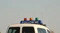 Airport. Light signals support car "Follow me" Red, yellow, green HD Footage
