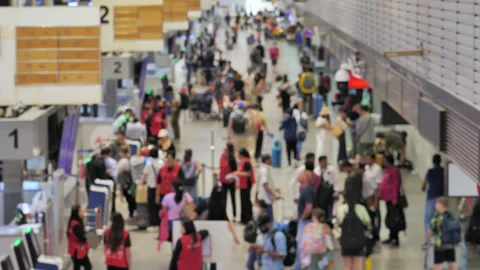 Airport passage in front of check-in counters, blurred lengthwise perspective Stock Footage 326390285