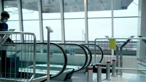 Airport passenger passing through the control turnstile. Stock Footage 221121586