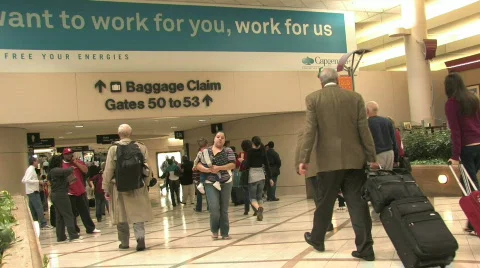 Airport passengers leaving gate 2 HD Stock Footage 109280