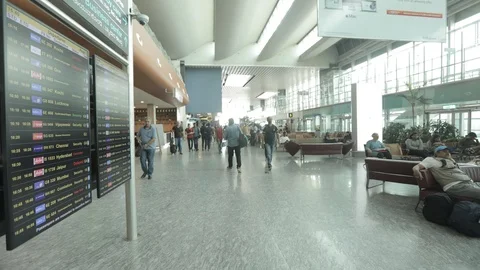Airport Passengers With Time Table Board Stock Footage 108200493