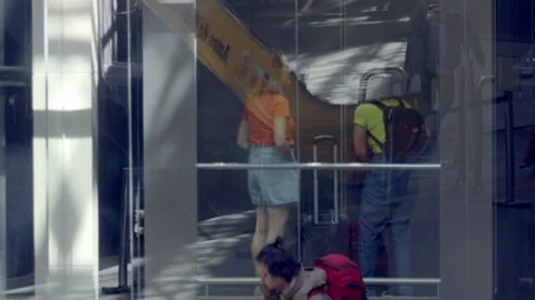 Airport passengers using the elevator to... | Stock Video | Pond5