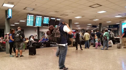 Airport Passengers Wait To Board Stock Footage