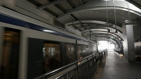 Airport rail link train while approaching station Stock Footage 196812535