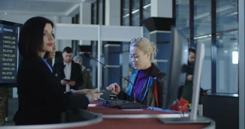Airport security personnel processing passengers 스톡 동영상 87143181